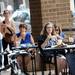 People eat their lunch on the patio as Lisa Pappas and Michael Weiss perform during the AnnArbor.com Summer 2012 Concert Series on Friday. Melanie Maxwell I AnnArbor.com